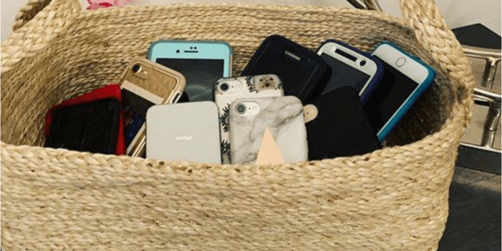 Phones in a wicker basket